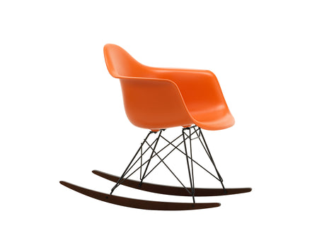Eames RAR Plastic Armchair in Rusty Orange with Basic Dark Base and Dark Maple Rockers by Vitra