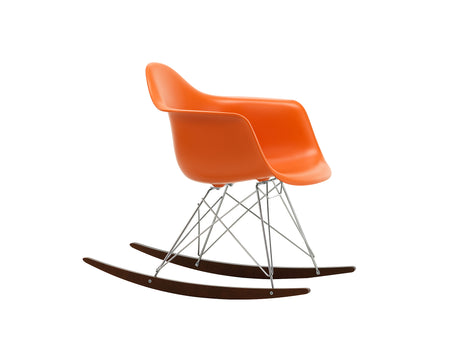 Eames RAR Plastic Armchair in Rusty Orange with Chrome Base and Dark Maple Rockers by Vitra
